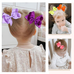 Clipband black grosgrain bows attach easily for little girl hairstyles.