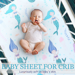 Cloele Mermaids crib sheet folded and ready for nursery storage.