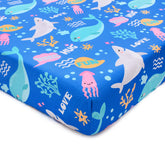 Cloele Ocean shark-pattern crib sheet for a cozy nursery.