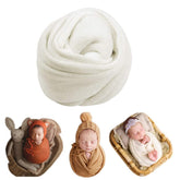 Coberllus newborn wrap in white close-up showing soft knit texture for photoshoots