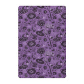 Coikll witch-themed fitted crib sheet on standard crib mattress with snug elastic edge.