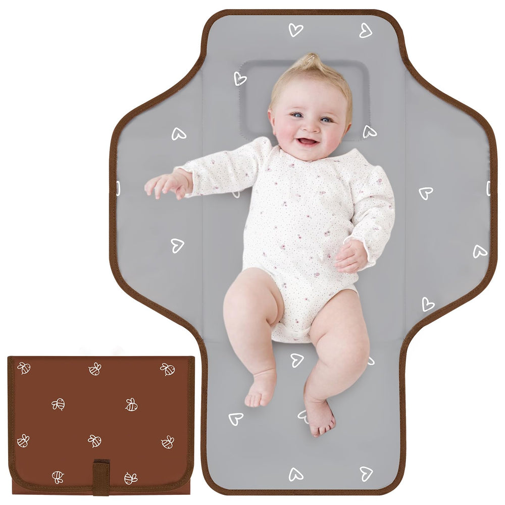 Coinarin portable diaper-changing-pad brown-bee open shows waterproof surface for quick cleanups.