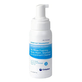 Coloplast Bedside Care Foam 8oz bottle on a nightstand for quick bedside cleansing.