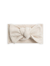 Colored Organics Hattie Bow Wrap Headband in Heather Oat Waffle, soft and adjustable for babies.
