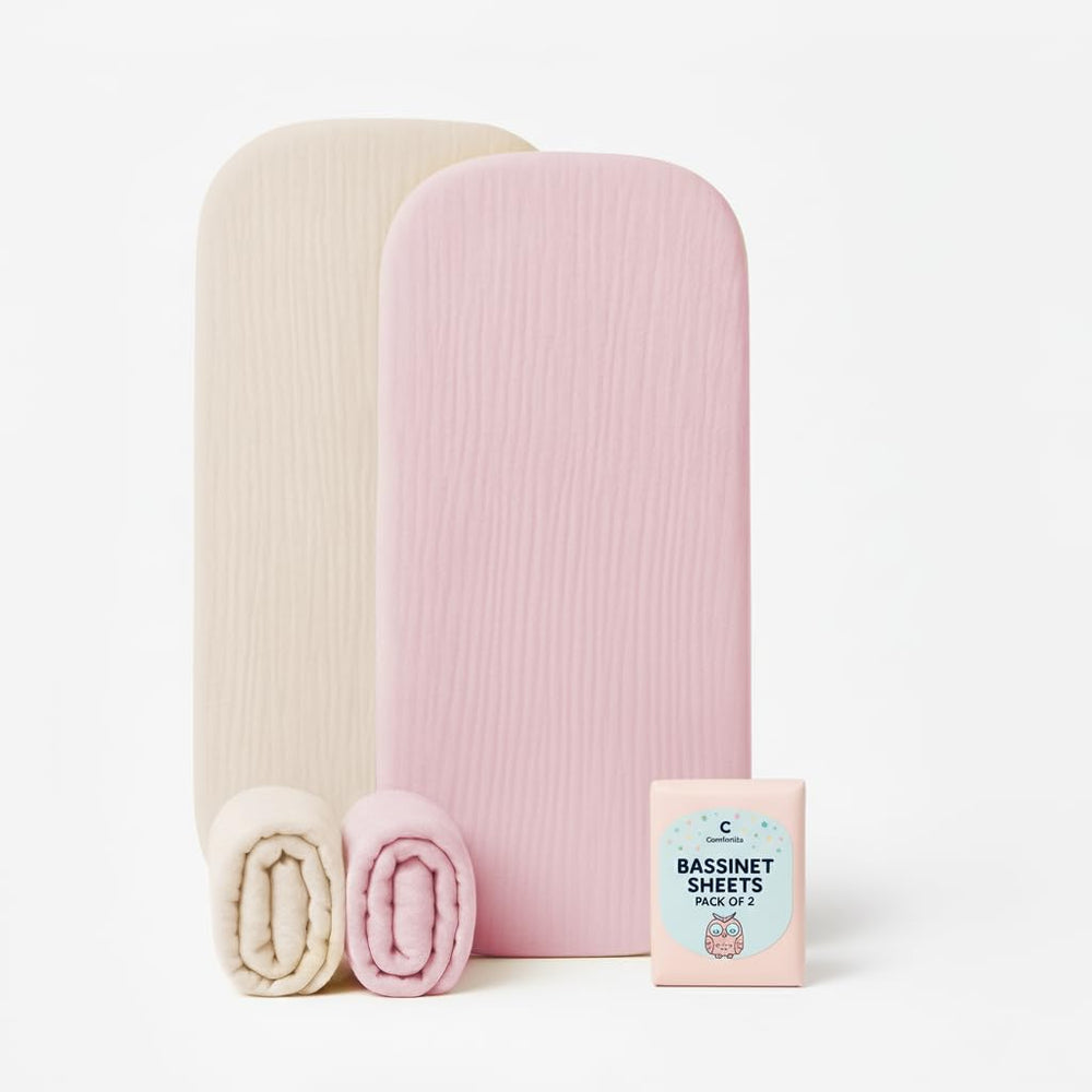 Comforista muslin bassinet sheets 33x17 pink beige front view with snug fit.