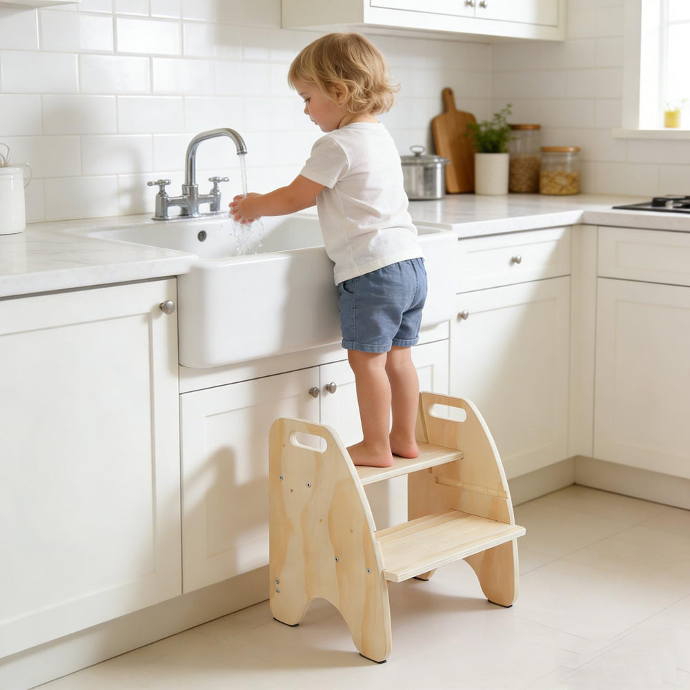 Comfoyar wooden toddler step stool in 2-step configuration for independent daily tasks.