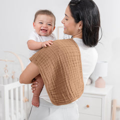 Comfy Cubs 6-layer muslin burp cloths absorb moisture quickly to keep shoulders dry.