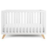 Comfy Cubs baby crib with adjustable-height feature for growing babies.