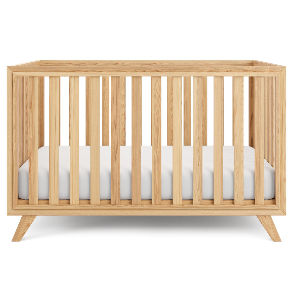 Comfy Cubs baby crib with adjustable mattress height for growing babies.