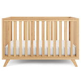 Comfy Cubs baby crib with adjustable mattress height for growing babies.