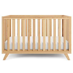 Comfy Cubs baby crib with adjustable mattress height for growing babies.