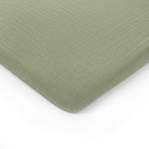 Comfy Cubs bassinet sheet flat lay in breathable muslin cotton.