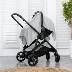 Comfy Cubs car seat cover acts as a sun shield to block sun for baby comfort.