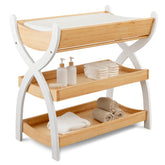 Comfy Cubs changing table in natural wood with two open shelves for organized diaper storage