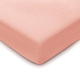Comfy Cubs Lace Pink Muslin crib sheet flatlay shows soft breathable fabric.