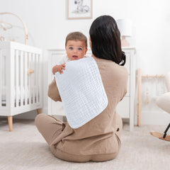 Comfy Cubs burp cloths in white offer full shoulder coverage for messes.