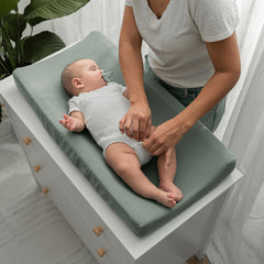 Comfy Cubs fern cover fitted on a pad shows secure elastic edge for snug fit.