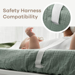 Comfy Cubs fern changing pad cover with safety strap openings for secure diaper changes.