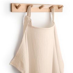 Comfy Cubs Muslin Nursing Cover in sand color, soft and breathable.