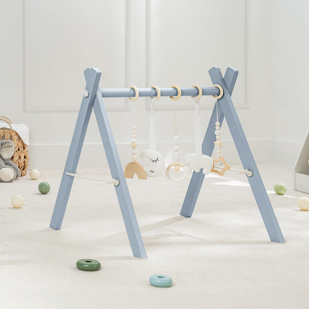 Comfy Cubs wooden play gym with natural finish top view shows a safe pinewood surface.