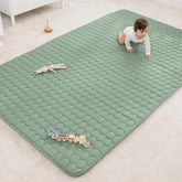 Comfy Cubs rectangle play mat in fern on floor, soft surface for babies