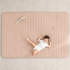 Non-slip bottom keeps the mat stable on smooth floors for safe play.