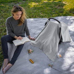 Comfy Cubs car seat cover features a secure snap closure to stay in place.