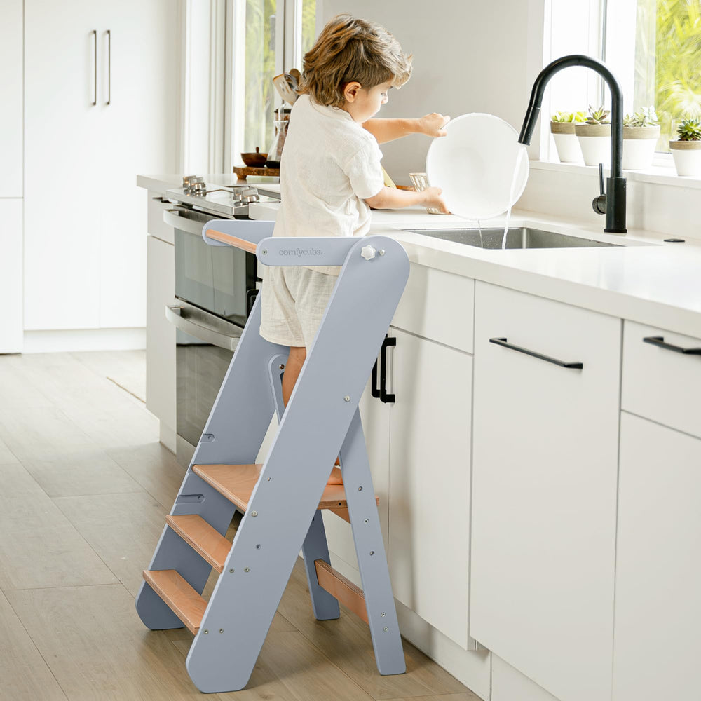 Comfy Cubs step stool with three heights helps kids reach sinks safely.