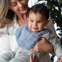 Comfy Cubs unisex Pacific Blue bibs add color to outfits.