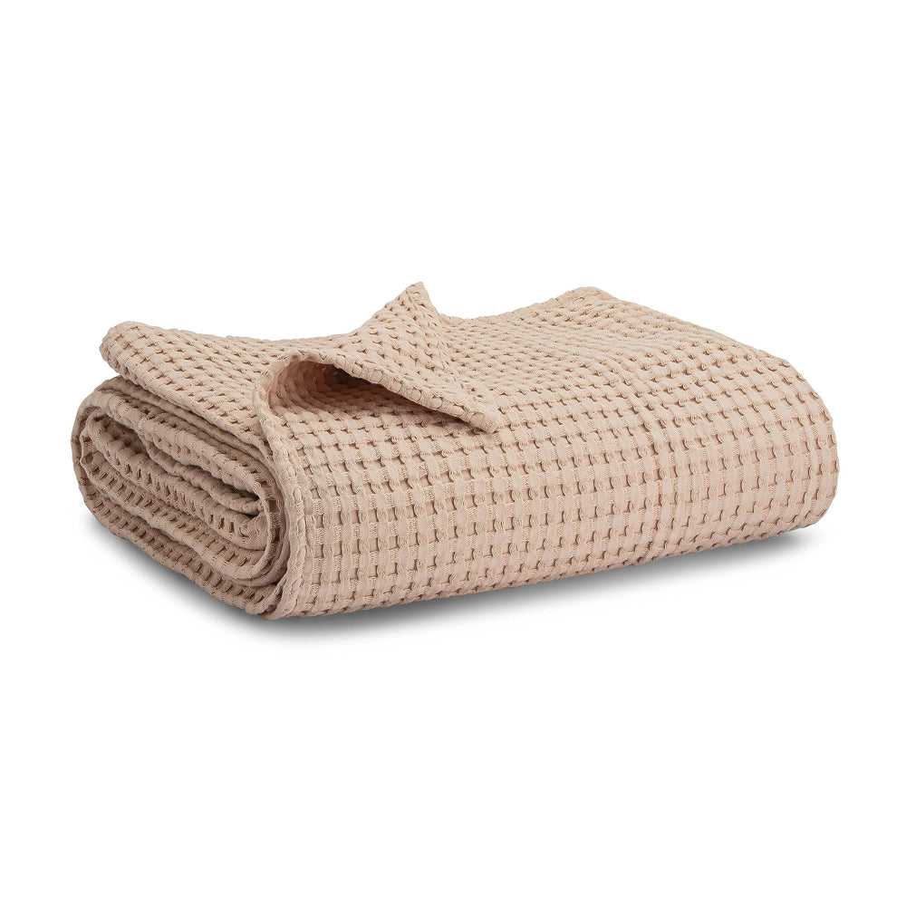 Comfy Cubs waffle blanket texture close-up showing breathable cotton warmth