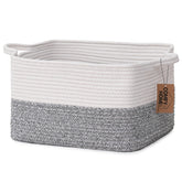 COMFY-HOMI cotton rope basket with handles on a shelf for easy toy storage.
