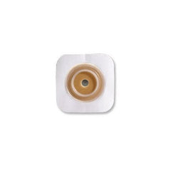 Close-up of ConvaTec SUR-FIT Natura barrier with tape collar on a 70mm white flange for secure fit.