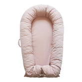 CooCooBaby Deluxe Lounger cocoon design for cozy newborn comfort.