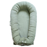 CooCooBaby Deluxe Lounger cocoon design for snug newborn comfort and security.