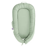 CooCooBaby infant lounger front view in spring green, cozy newborn lounging