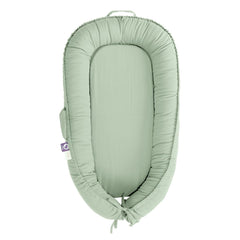 CooCooBaby infant lounger front view in spring green, cozy newborn lounging