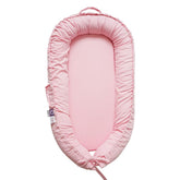 CooCooBaby infant lounger with misty rose cover offers breathable comfort for newborns