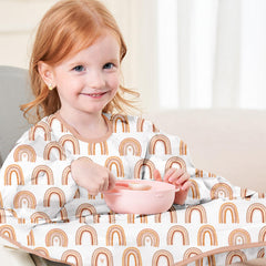 CoolaPeach bib with table attachment keeps feeding area tidy