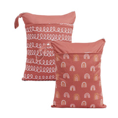 CoolaPeach wet bag in circles pattern with two pockets keeps diapers organized on the go