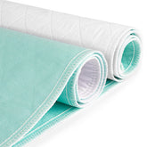 CoolShields waterproof bed pad on a bed protects against nighttime leaks