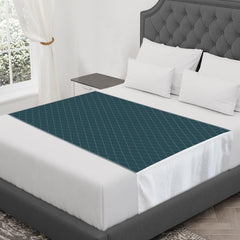 CoolShields waterproof bed pad on mattress for leak protection