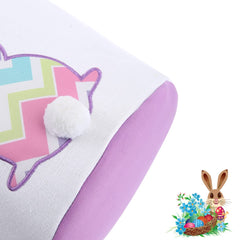 Close-up of fluffy tail detail on the striped bunny.