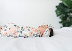 Copper Pearl bows coordinate with swaddles and car seat covers.