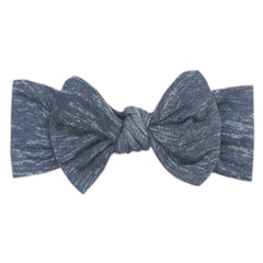 Copper Pearl premium denim headband bow for newborns, stylish and soft.