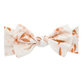 Copper Pearl newborn headband bows with soft stretch for gentle, comfy wear.
