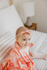 Copper Pearl Remi bow with blush stripes, soft stretch for comfy all-day wear
