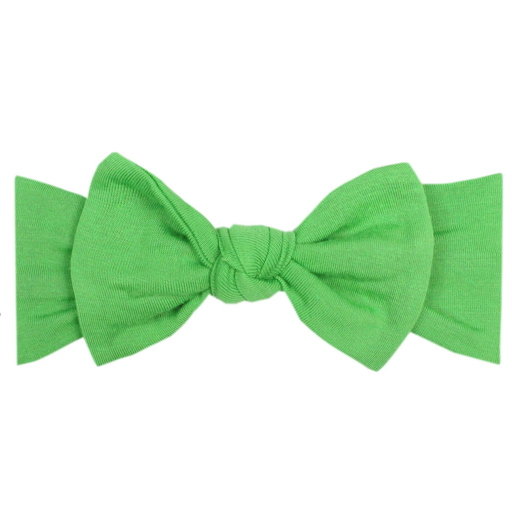 Copper Pearl baby bows soft band closeup showing premium comfort and stretch