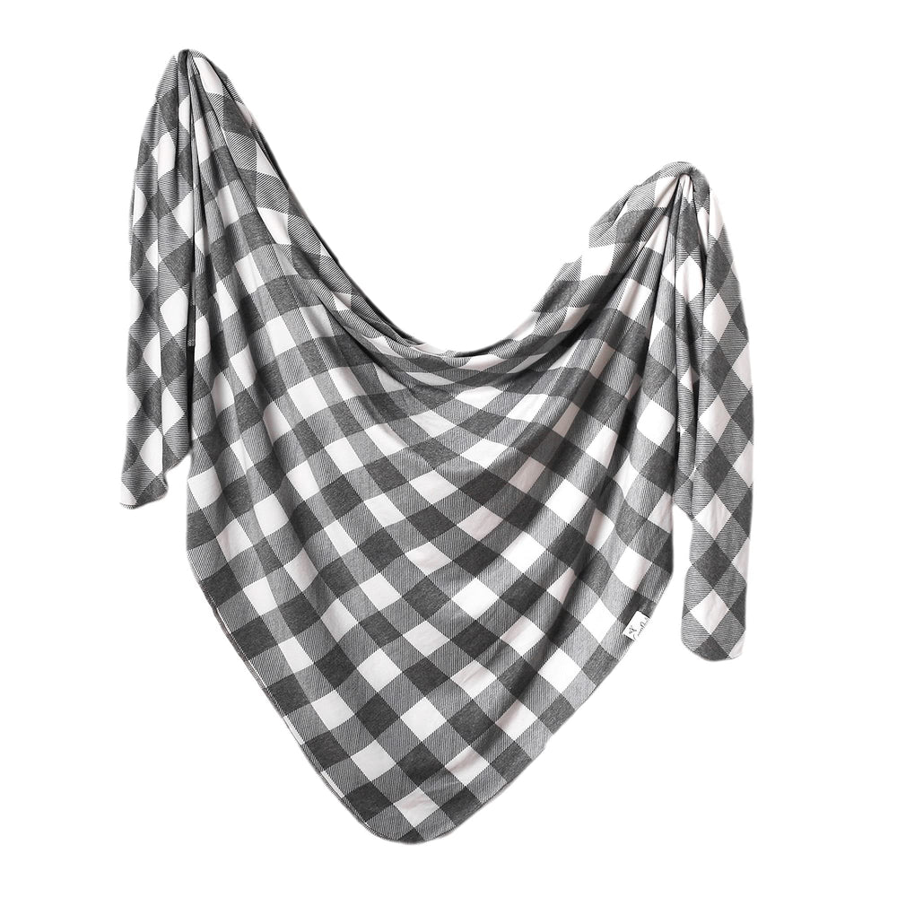 Copper Pearl soft-stretchy-knit swaddle blanket offers cozy newborn comfort.