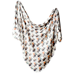 Copper Pearl bison swaddle-blanket close-up shows premium knit softness for cozy swaddling.