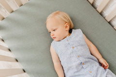 Copper Pearl Briar crib sheet in premium gift packaging, ideal for baby showers